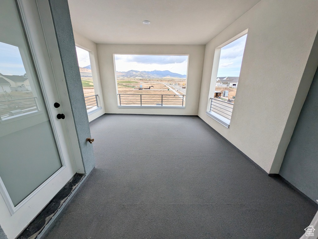 Interior space with a mountain view and a healthy amount of sunlight
