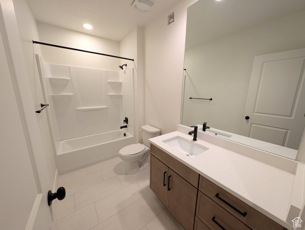 Full bath featuring  shower combination, toilet, visible vents, recessed lighting, and vanity