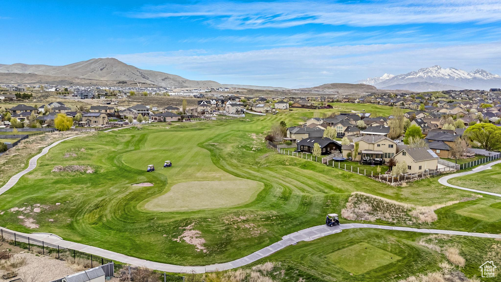 Aerial view featuring a mountain view, golf course view, and a residential view