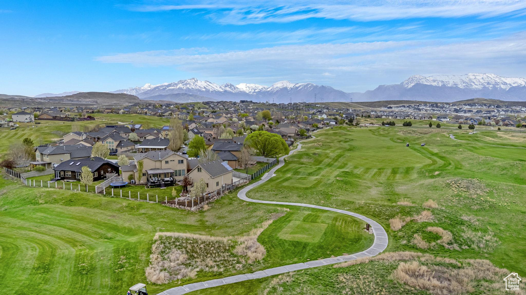 Drone / aerial view featuring a residential view, a mountain view, and view of golf course