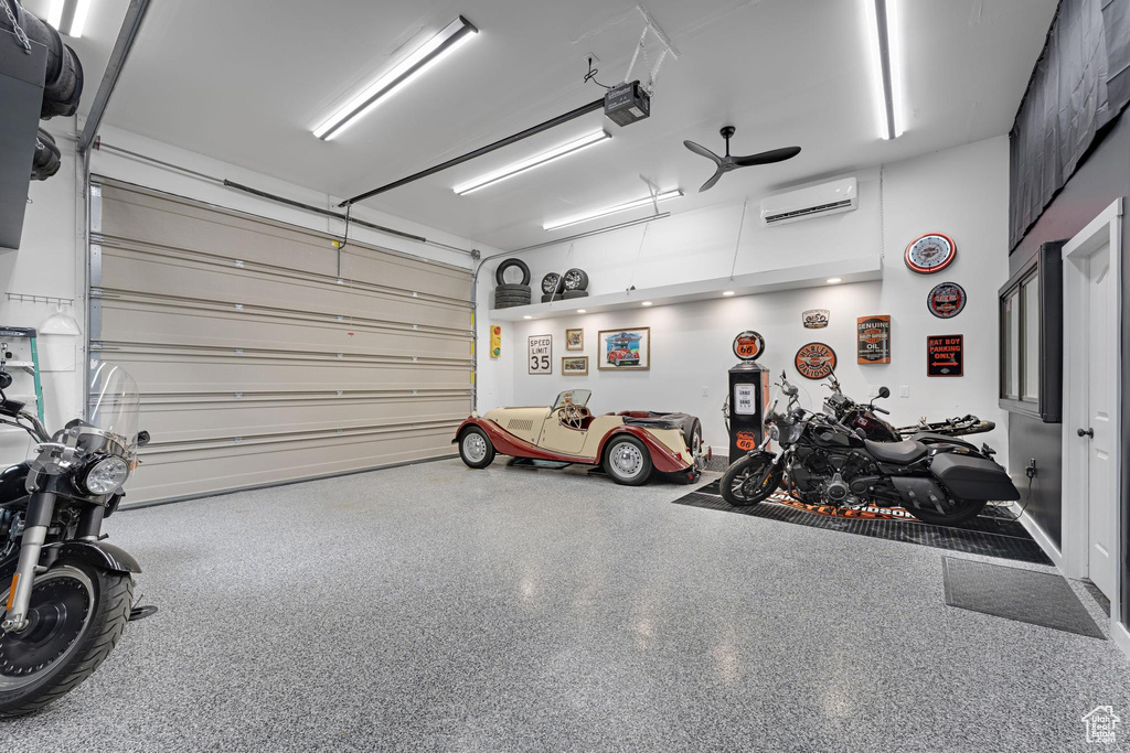 Garage with a garage door opener and a wall unit AC