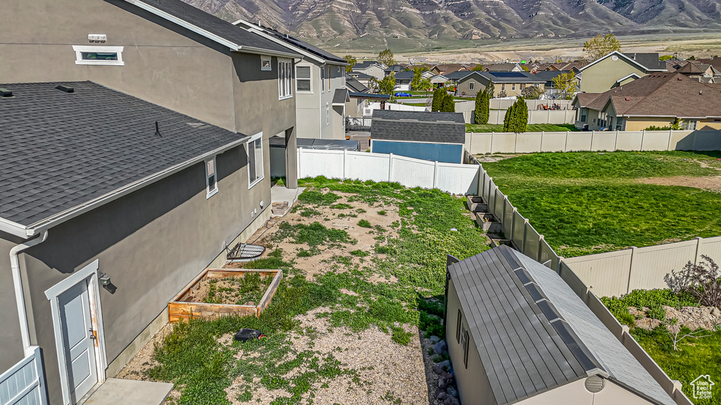 Exterior space featuring a mountain view and a residential view