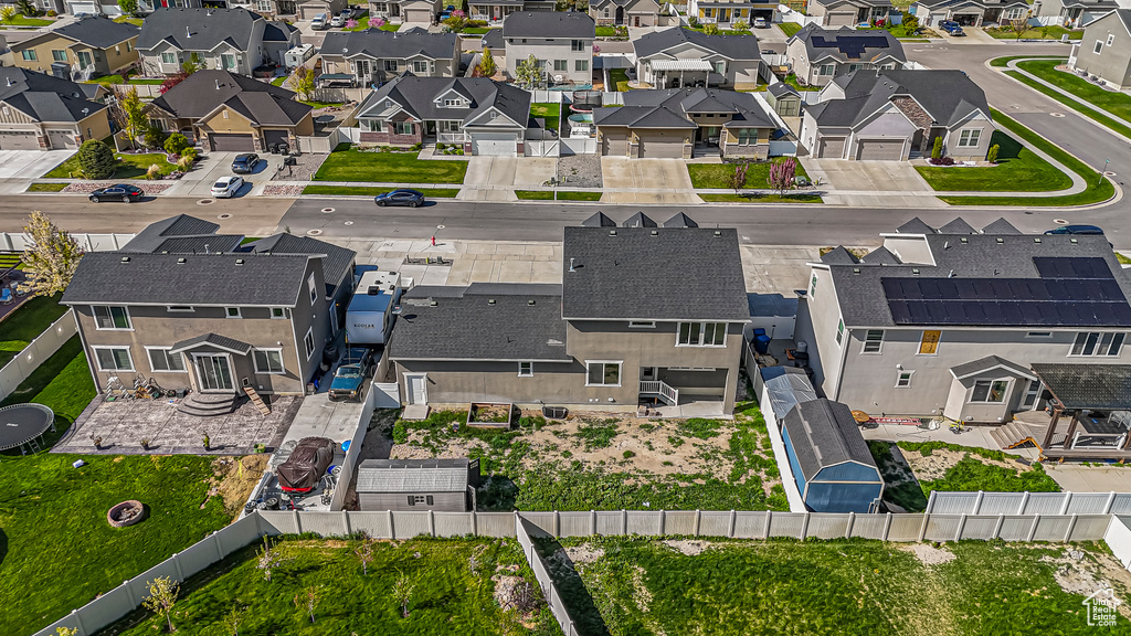 Birds eye view of property with a residential view