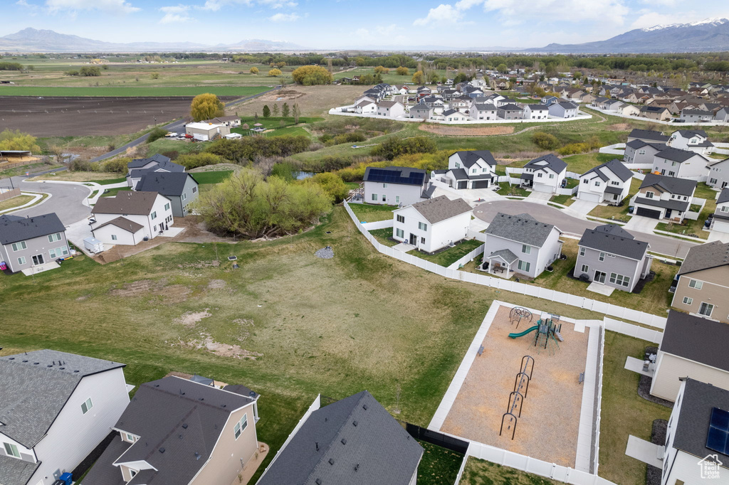 Drone / aerial view with a mountain view and a residential view