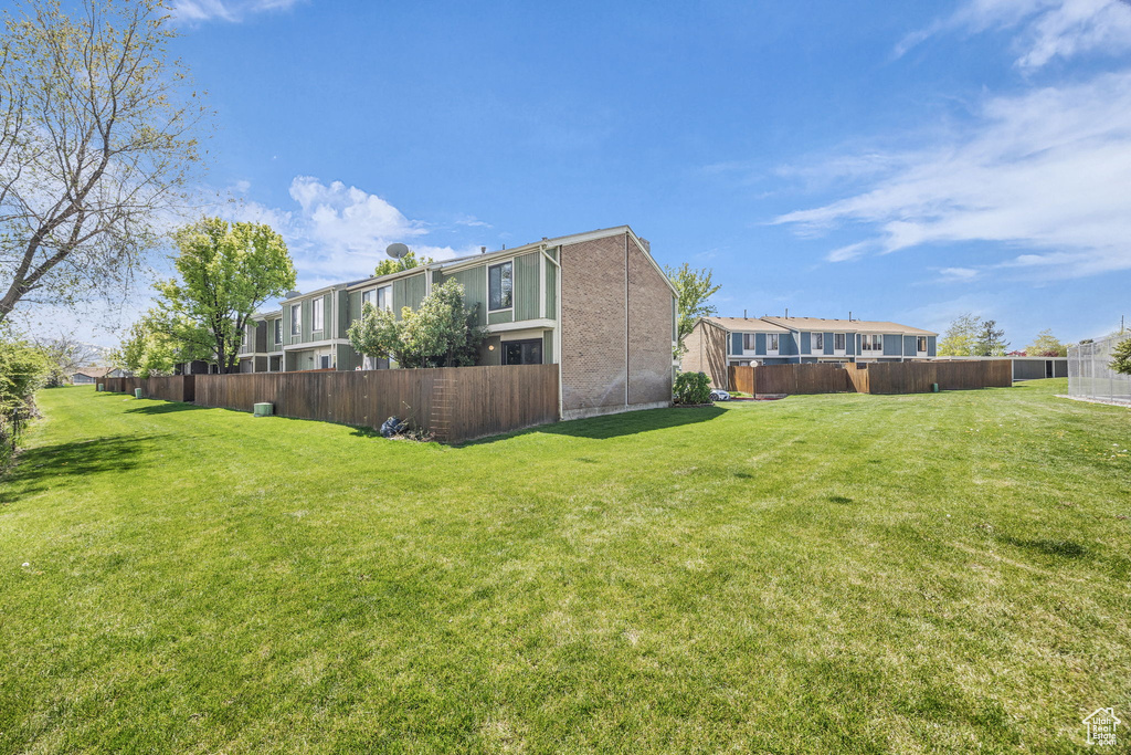View of yard with fence