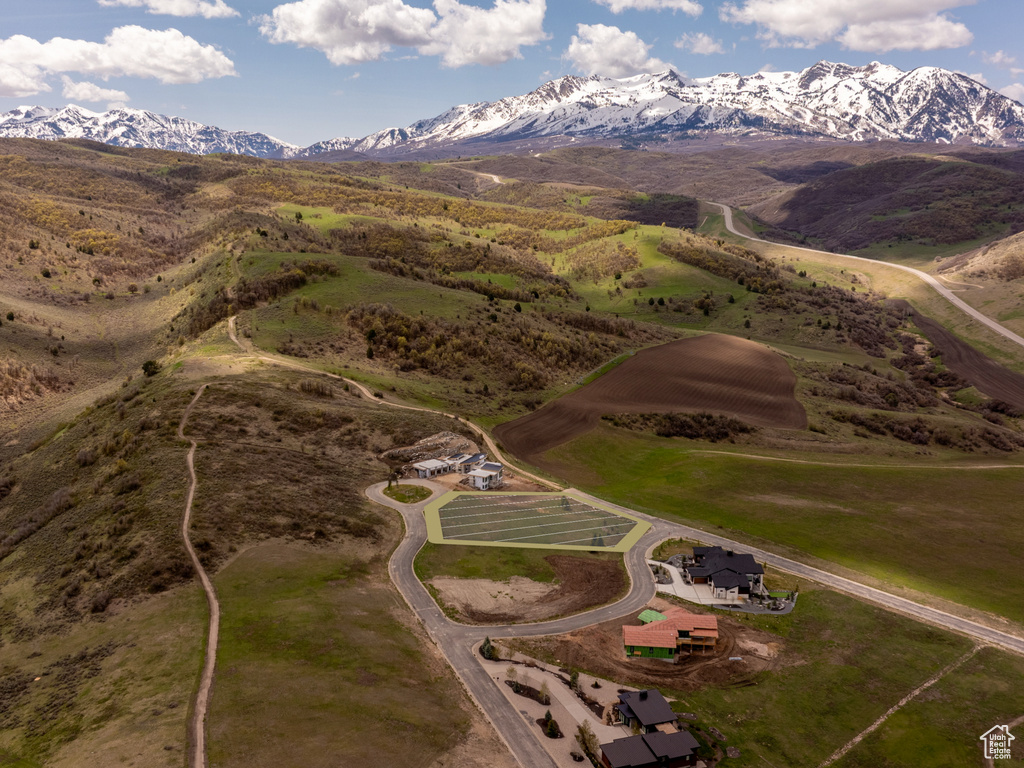 Birds eye view of property featuring a mountain view