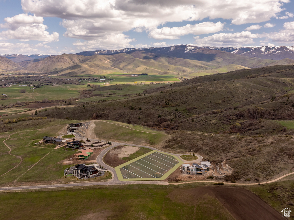 Drone / aerial view with a mountain view and a rural view