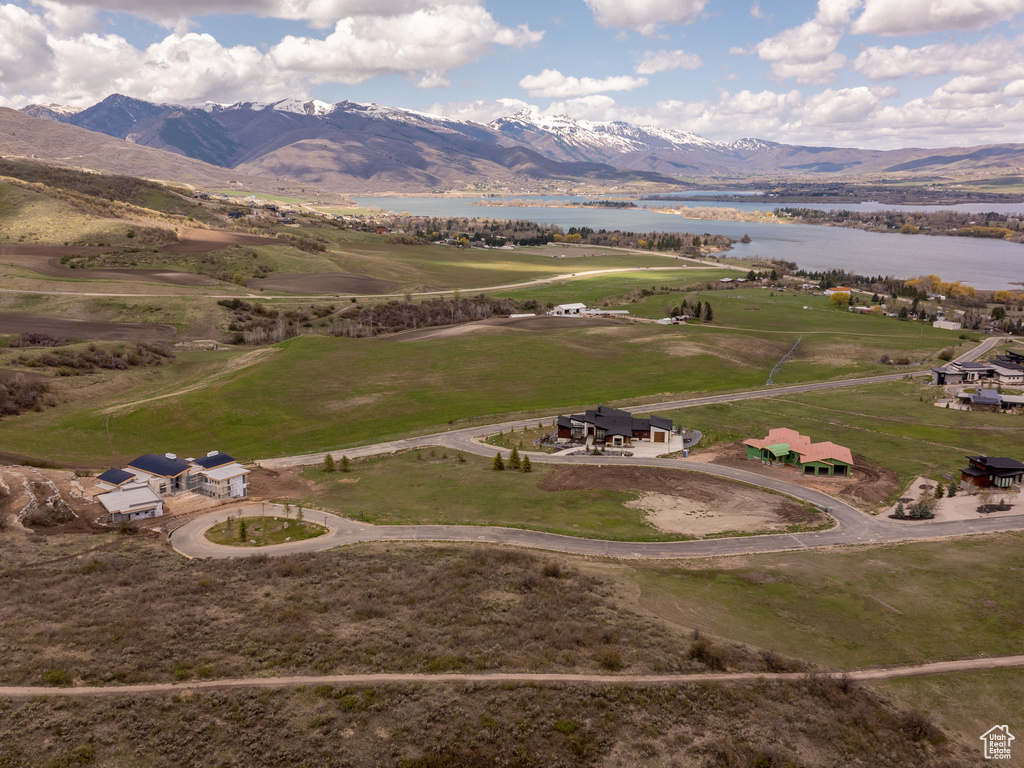 Bird's eye view featuring a water and mountain view