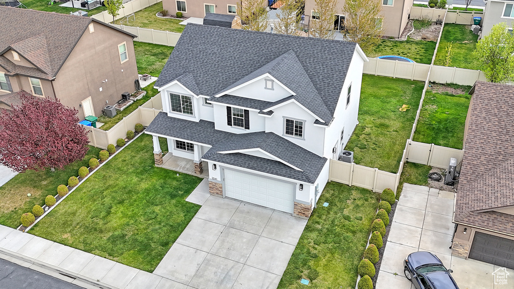 Birds eye view of property with a residential view