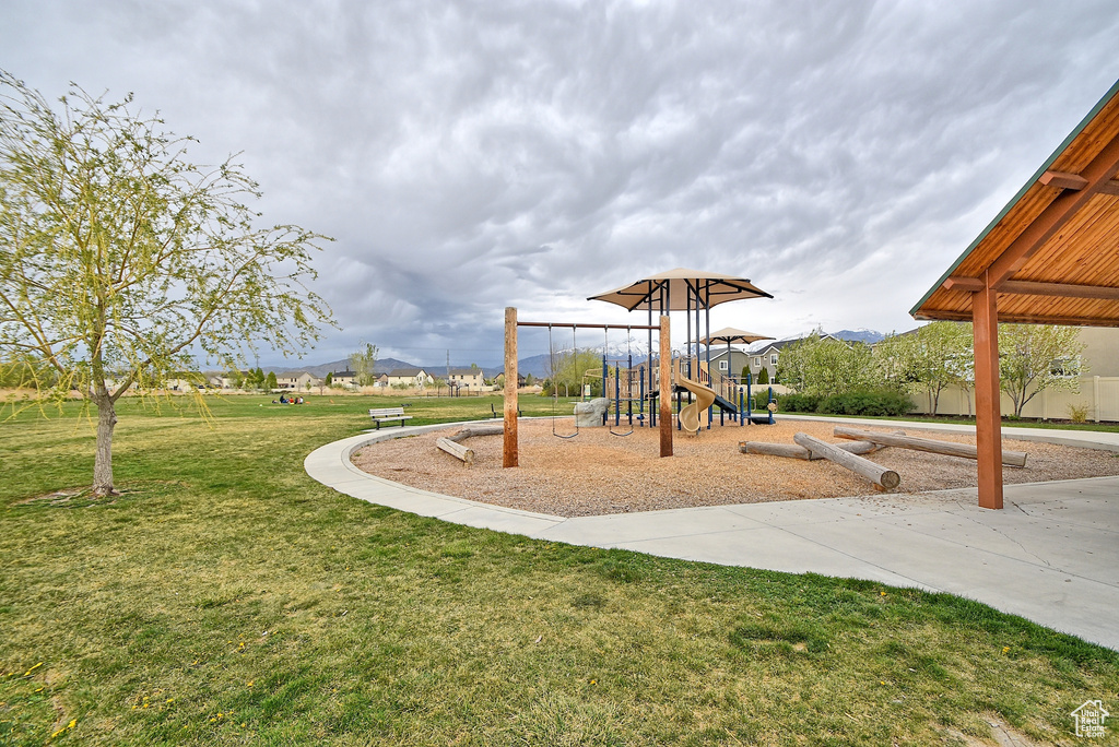 Communal playground featuring a lawn