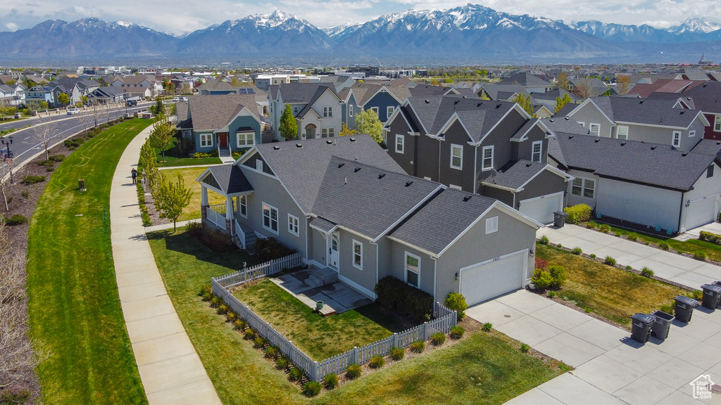 Aerial view featuring a mountain view and a residential view