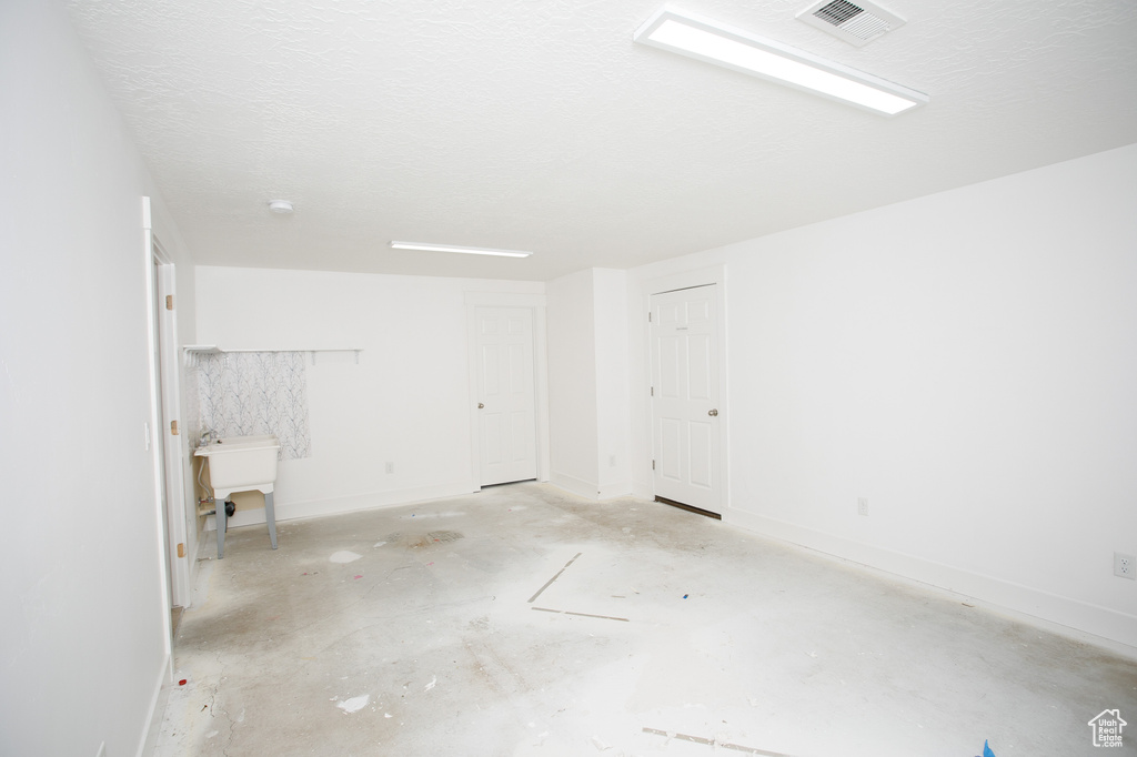 Interior space with baseboards and visible vents