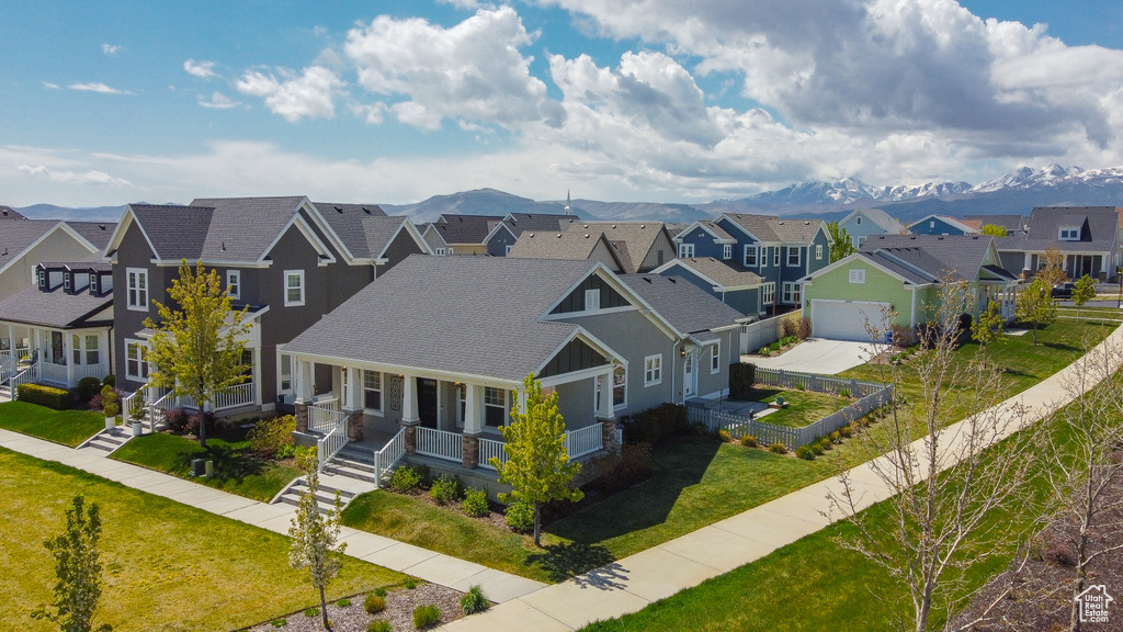 Drone / aerial view featuring a mountain view and a residential view