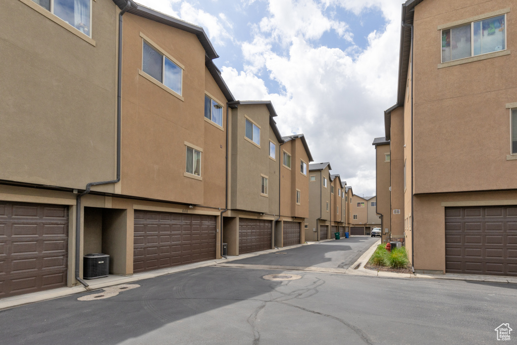 View of street featuring a residential view and curbs