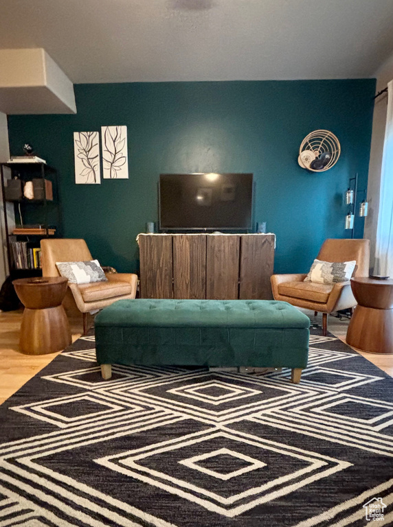 Living room featuring wood finished floors