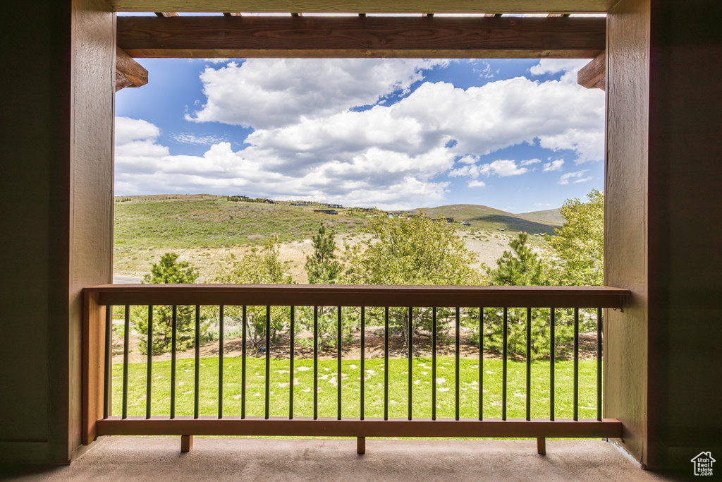 Balcony featuring a mountain view