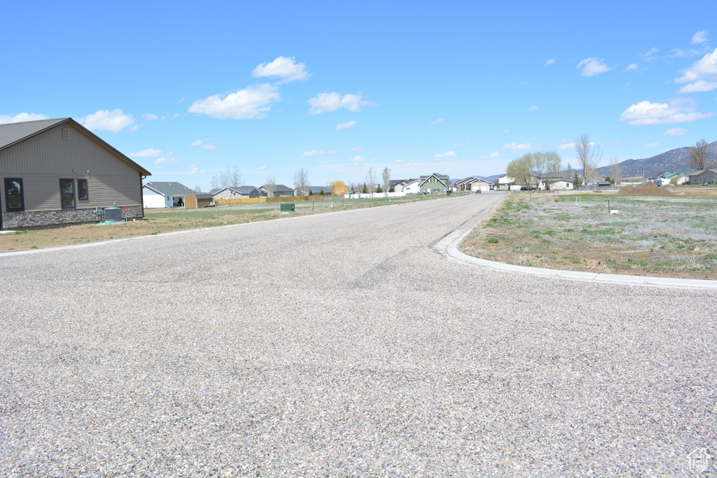 View of road with a mountain view and a residential view