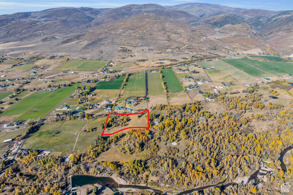 Drone / aerial view featuring a mountain view and a rural view