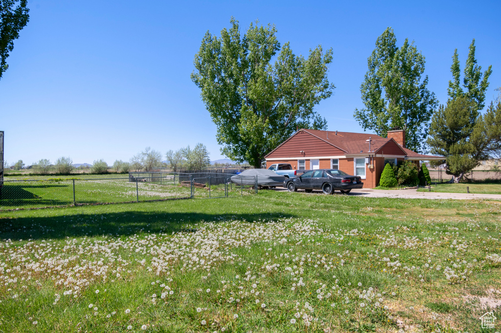 View of yard with fence