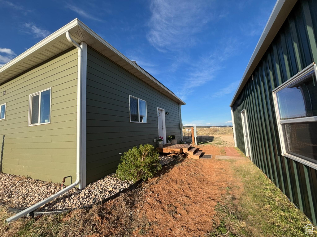 View of side of home with board and batten siding