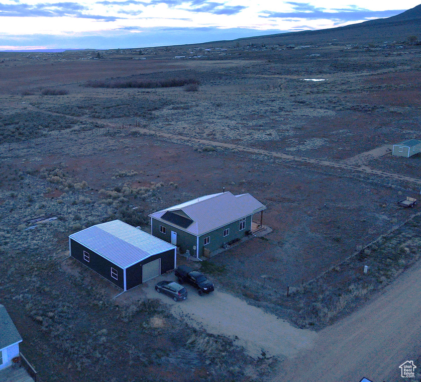 Drone / aerial view with a mountain view and a rural view