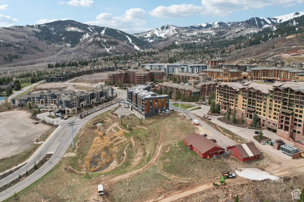 Birds eye view of property with a mountain view