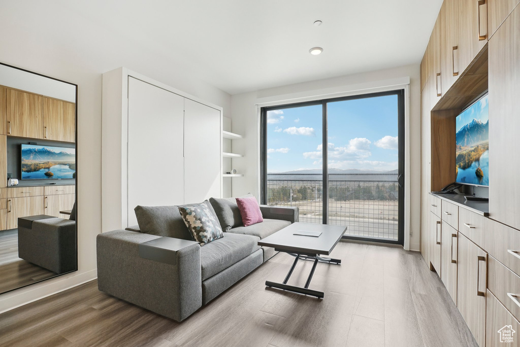 Living area featuring light wood-style floors