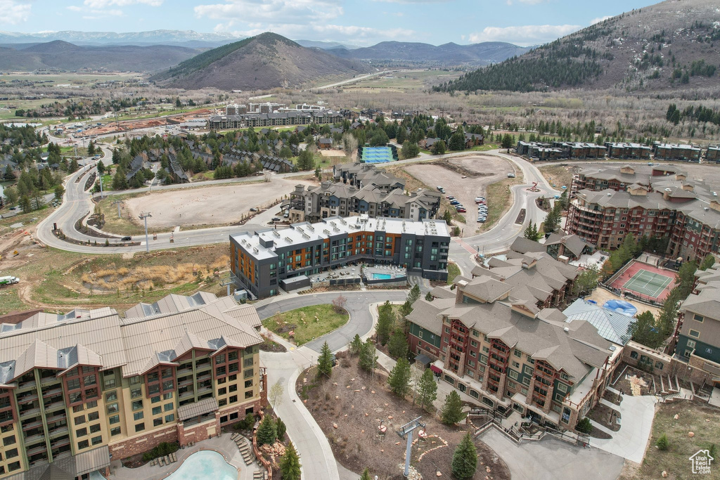 Birds eye view of property with a mountain view