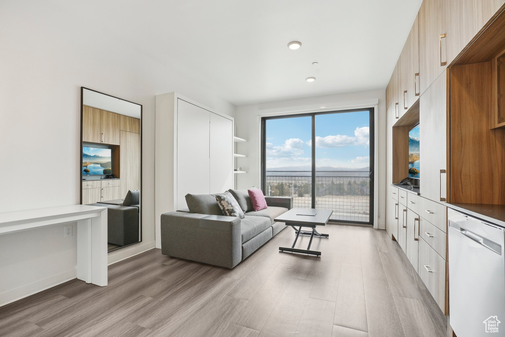 Living area featuring light wood-style flooring