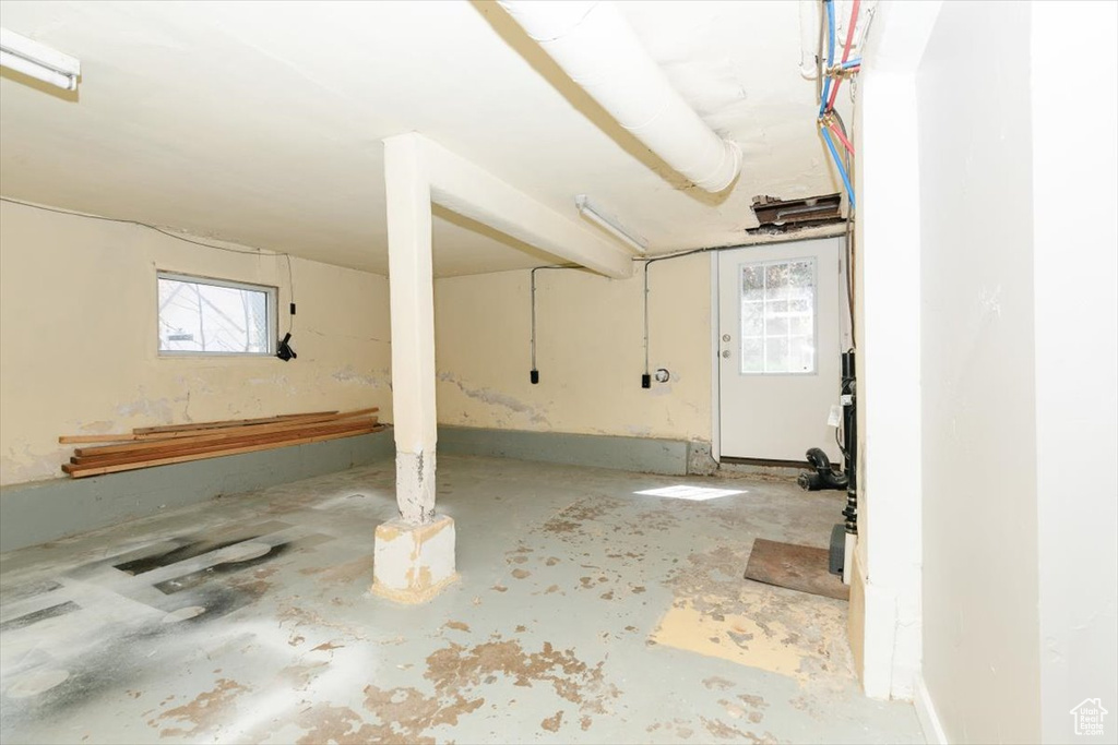 Basement featuring plenty of natural light