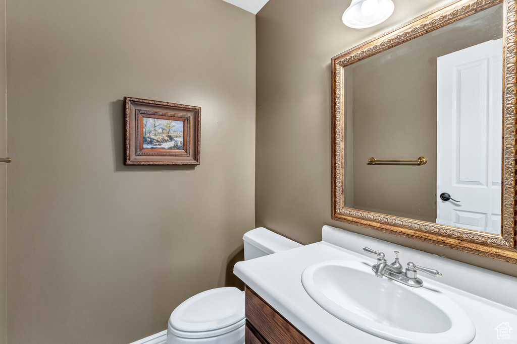 Bathroom with toilet and vanity
