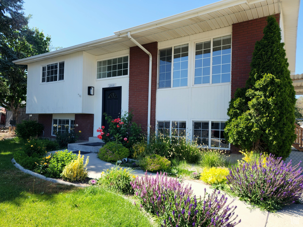 Property entrance with brick siding