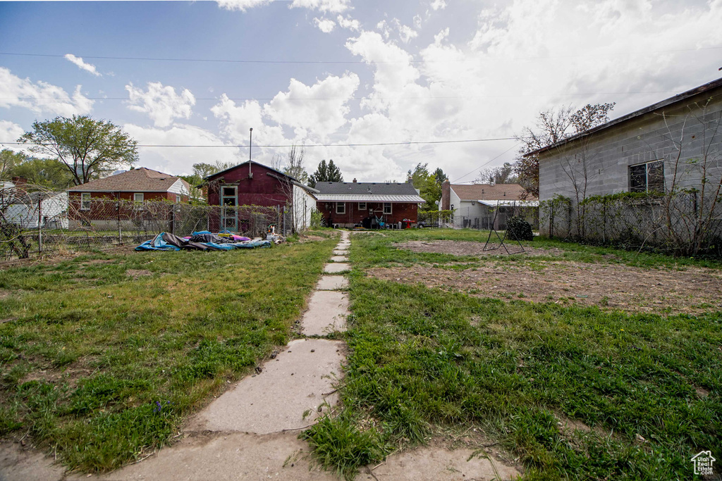 View of yard with fence
