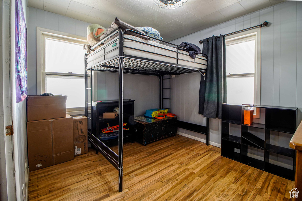 Bedroom with wood finished floors