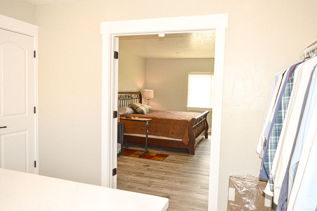 Bedroom featuring wood finished floors