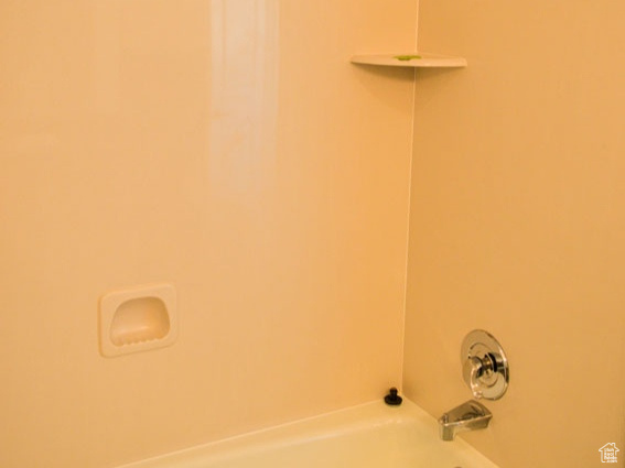 Bathroom with bathtub / shower combination