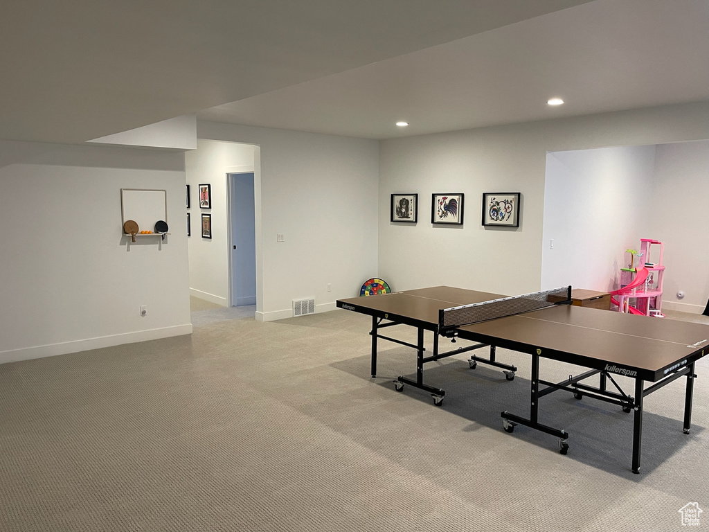 Recreation room with baseboards, visible vents, light carpet, and recessed lighting