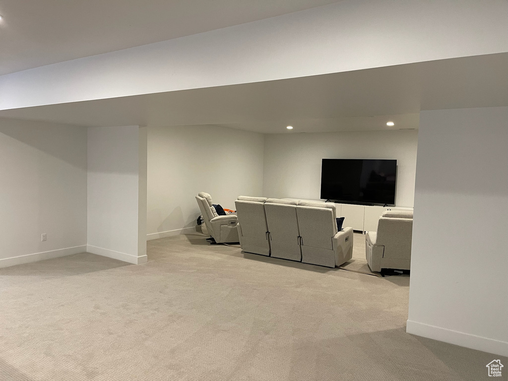 Interior space with recessed lighting, light carpet, and baseboards