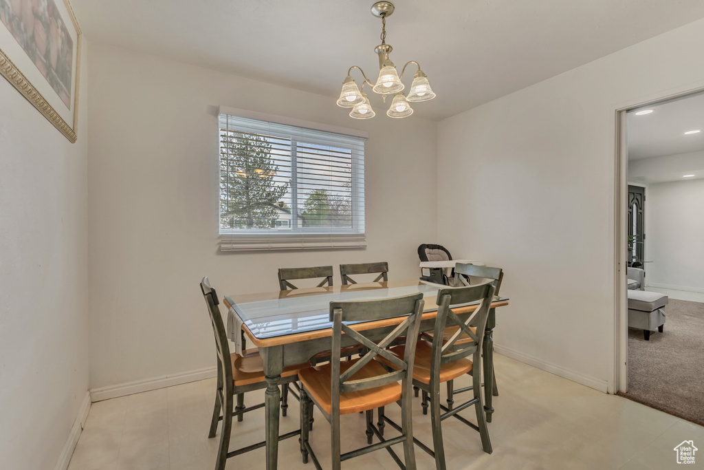 Dining room featuring an inviting chandelier, recessed lighting, and baseboards