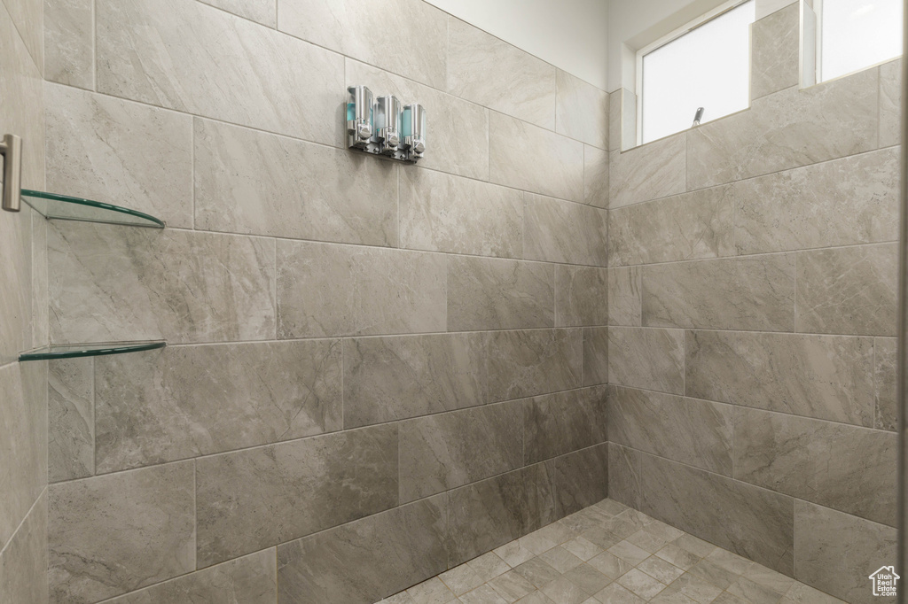 Bathroom featuring tiled shower