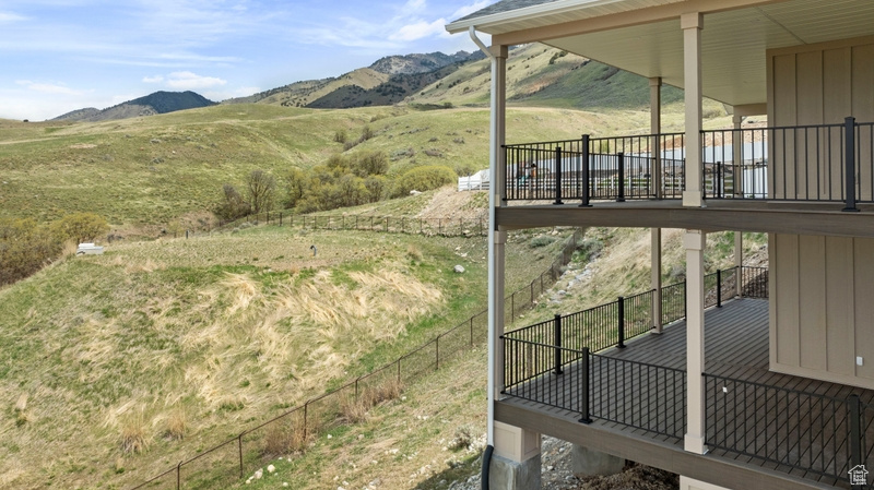 View of yard featuring a mountain view and a rural view