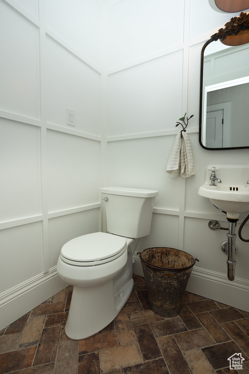 Half bathroom featuring toilet