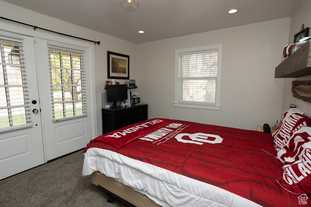 Bedroom featuring recessed lighting, french doors, and carpet