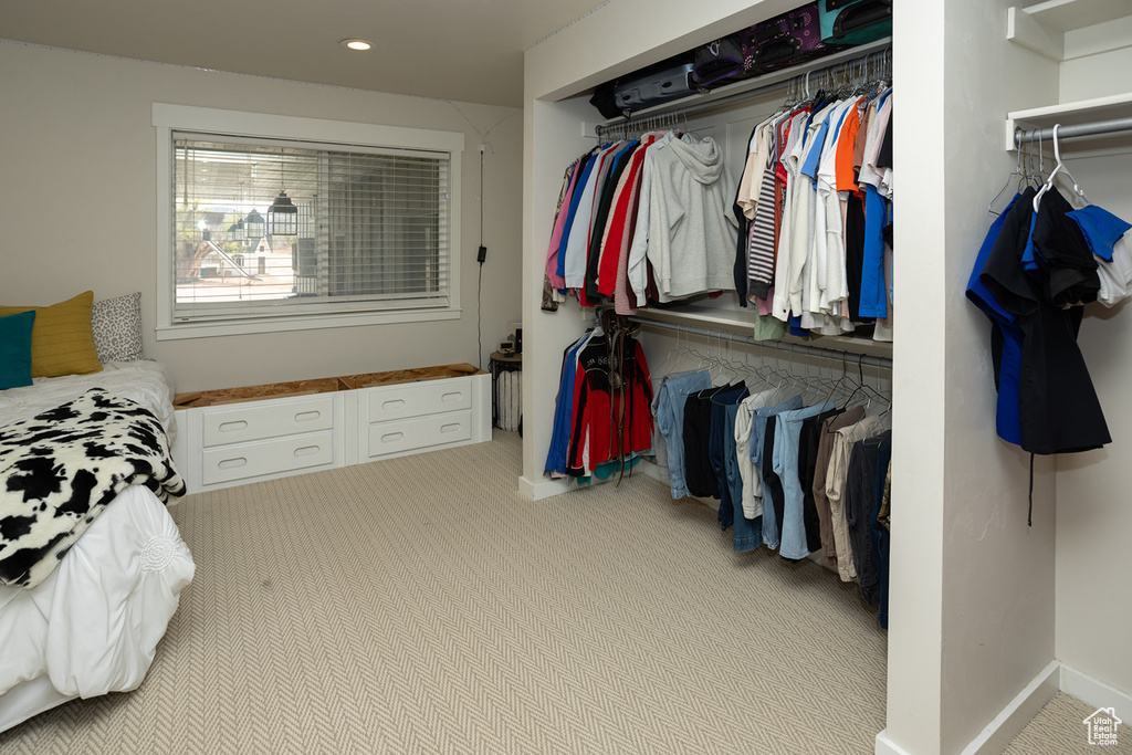 Bedroom with carpet flooring, recessed lighting, a closet, and baseboards
