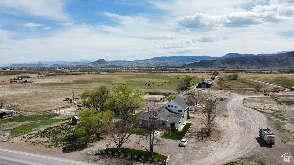 Birds eye view of property featuring a mountain view and a rural view