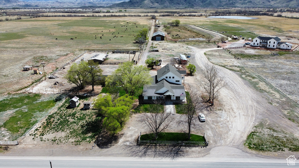 Drone / aerial view with a mountain view and a rural view