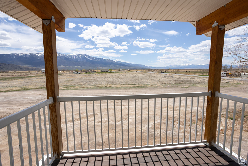 Wooden terrace with a mountain view and a rural view