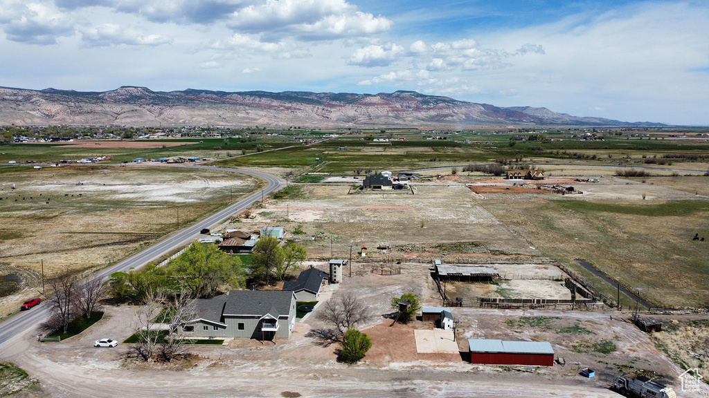 Birds eye view of property featuring a mountain view and a rural view