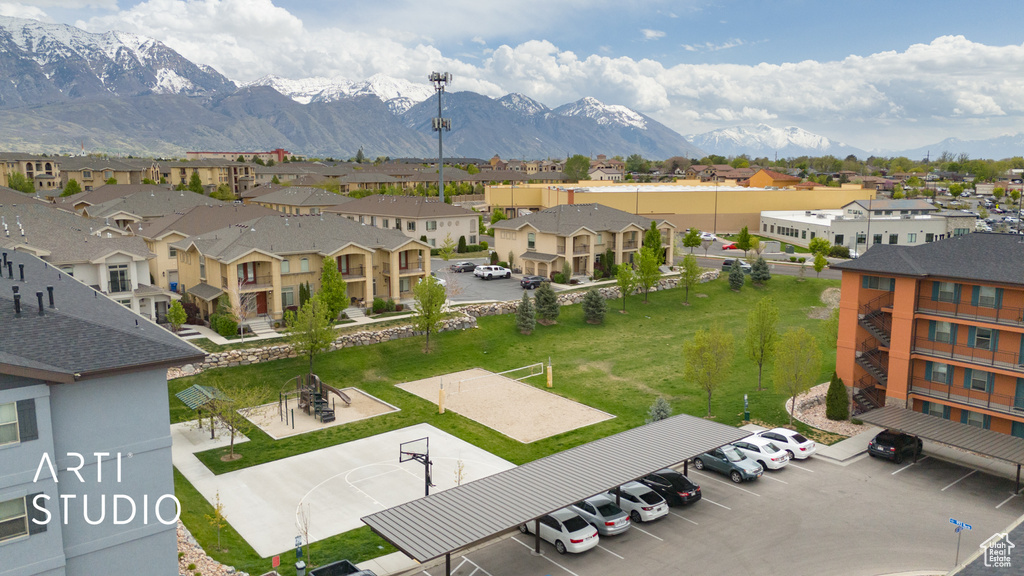 Drone / aerial view featuring a mountain view and a residential view