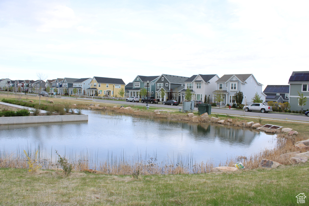 View of water feature with a residential view